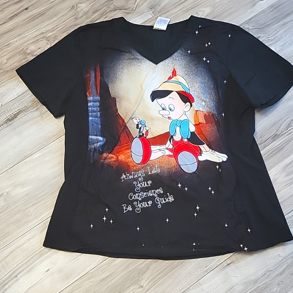 Flexible Pinocchio scrub top